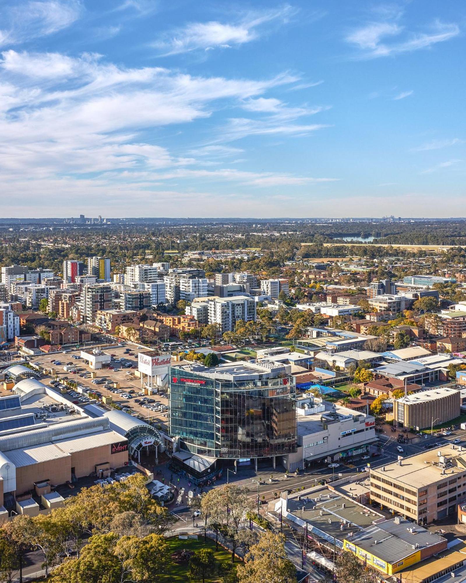 Meriton Suites Liverpool Exteriér fotografie Aerial view of the suburb